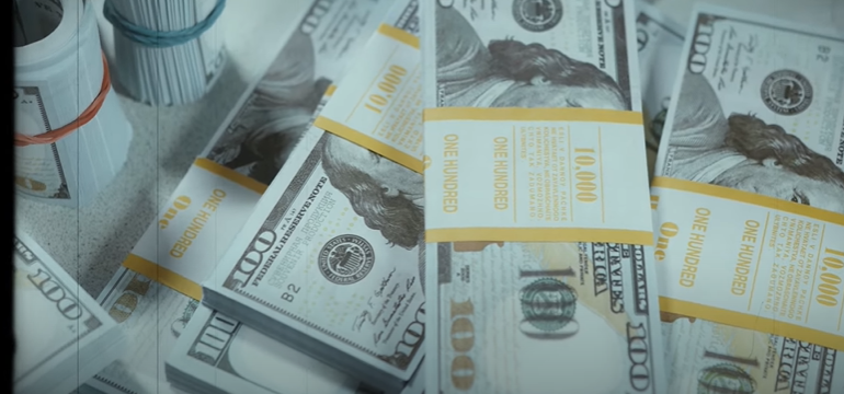 a stack of money on a table